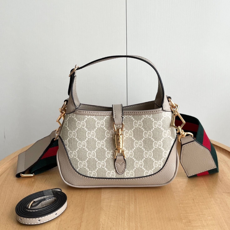 G*u*i top handle bags